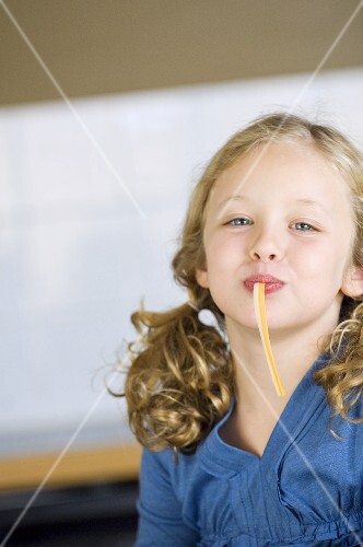 Girl eating string cheese
