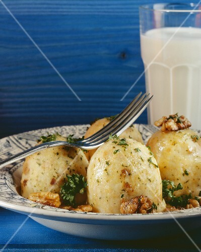 Herb dumplings with walnuts