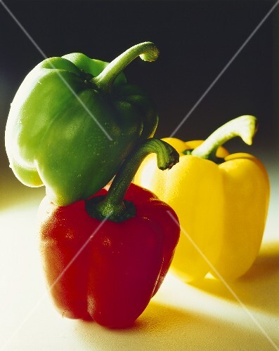 Red, green and yellow peppers