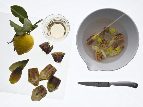 Fresh artichokes in lemon water