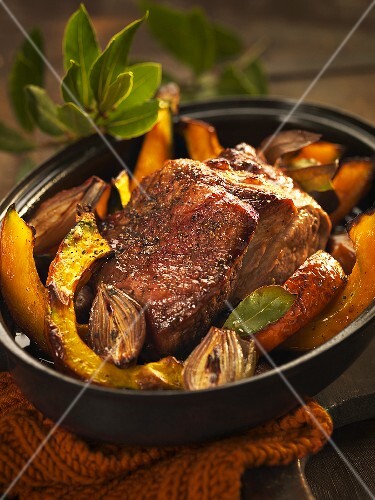 Roast pork with pumpkin wedges