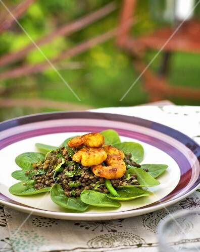 Lentil salad with breaded prawns