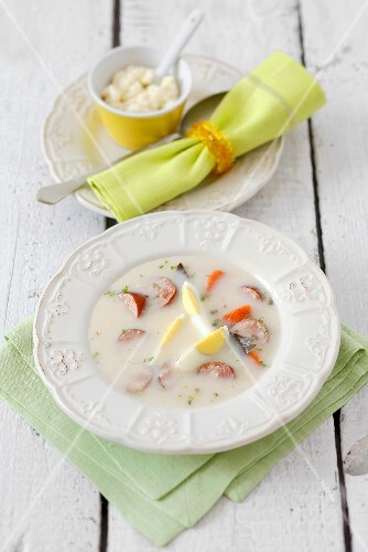 Zurek with sour cream, horseradish and boiled egg
