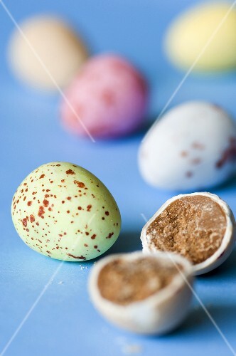 Chocolate eggs with pastel-covered coating