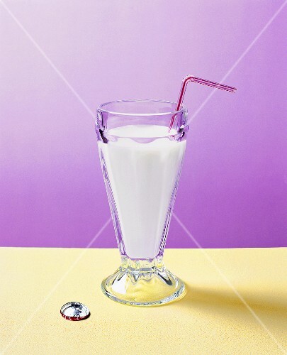 A milkshake with a straw