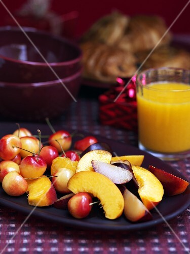 Christmas breakfast with fruit salad and orange juice