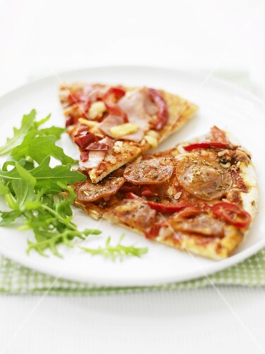 Two pieces of salami pizza