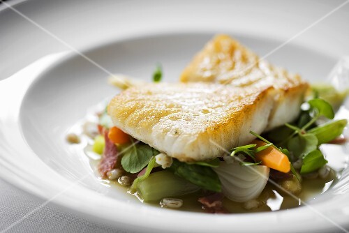 Halibut fillet on vegetables