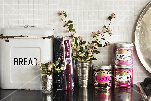 Bread and tea tins, books