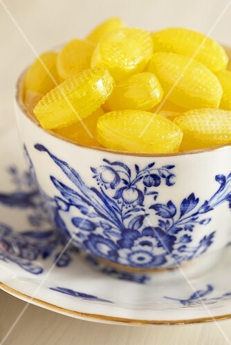 Yellow sweets in a cup