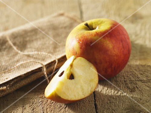 Cox's Orange Pippin, whole apple and a quarter