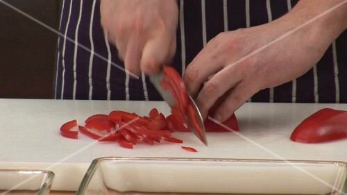 Chopping a red pepper