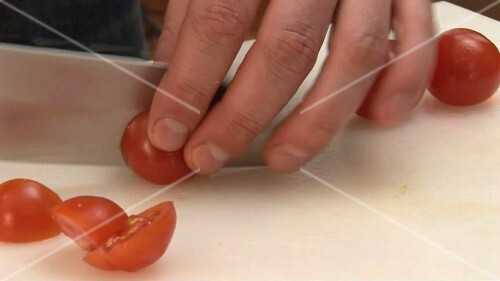 Quartering tomatoes