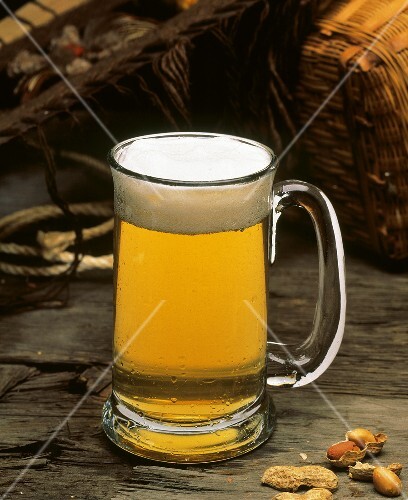 Full Beer Mug on Wood with Peanuts