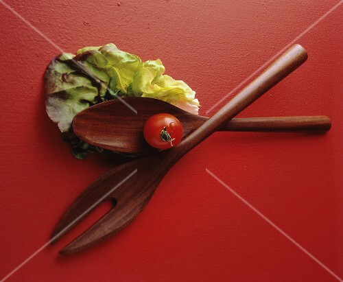 Salad Utensils with Lettuce Leaf and Tomato