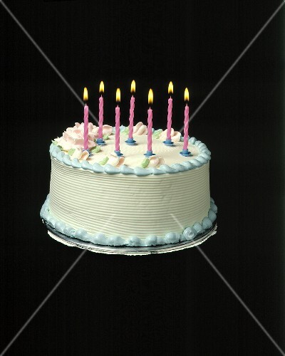 A Birthday Cake with Pink Candles