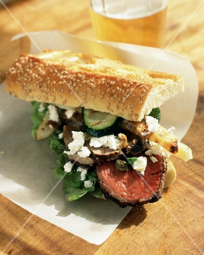 Sliced Steak and Feta on a Baguette