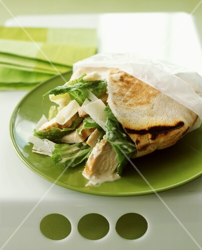 Caesar salad with chicken in pita bread