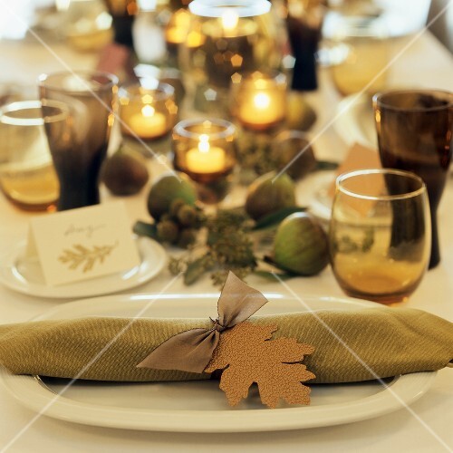 Laid table with autumnal feel, with fresh figs