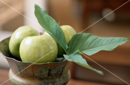 Granny Smith Apples with Leaf in a Bowl