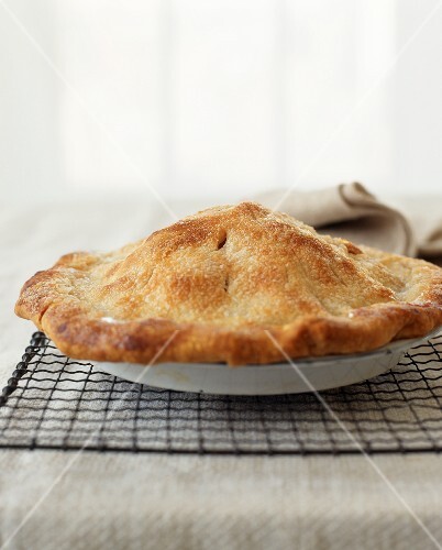 Whole Pie in Baking Dish on a Cooling Rack