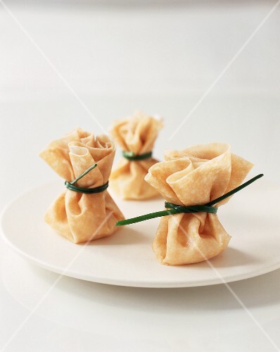 Asian Pouch Appetizers Tied with Chives