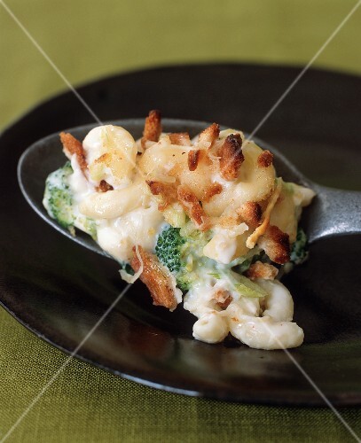 Spoonful of Baked Macaroni and Cheese with Broccoli on a Plate