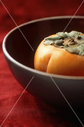 Persimmon in a Bowl