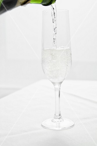 Pouring Glass of Champagne