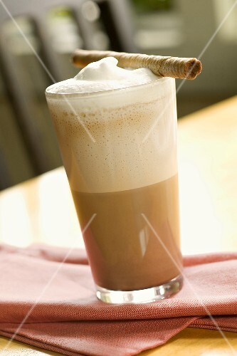 Coffee Drink in a Glass with a Pirouette Cookie