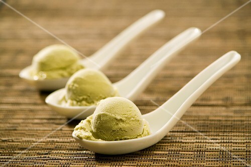 Scoops of Ice Cream on Three Small Spoons