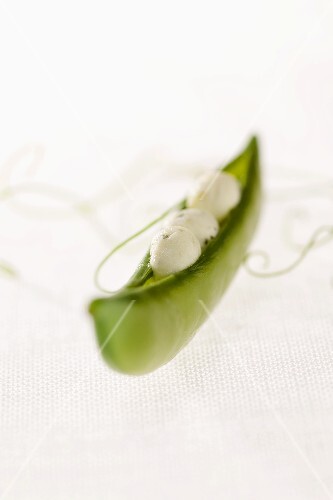 A Pea Pod Filled with Cheese Balls