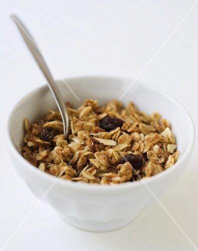 Bowl of Granola with Almonds and Raisin; Spoon
