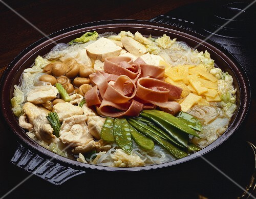 Chinese Hotpot; Iron Pot with Ham, Chicken, Vegetables and Bean Thread Noodles