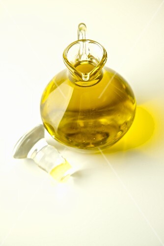 Pitcher of Organic Cold Press Olive Oil; Opened