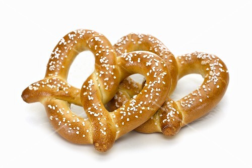 Two Soft Pretzels with Salt; White Background