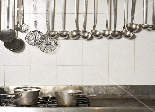 Cooking Utensils Hanging in Kitchen