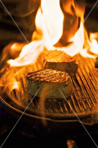 Two Steaks on Grill Pan; Flames