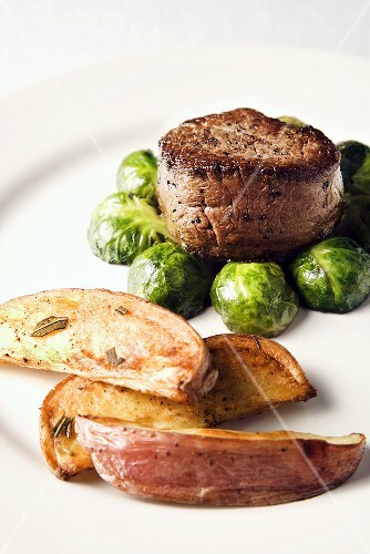 Beef Tenderloin on Brussels Sprouts, Potato Wedges