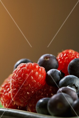 Fresh Blueberries and Raspberries (Close Up)