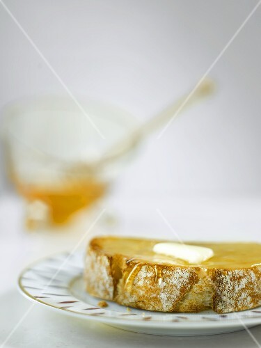 Slice of Bread with Butter and Honey