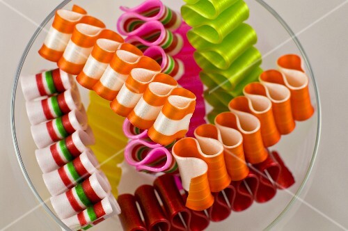 Colorful Ribbon Candy in a Glass Bowl; From Above